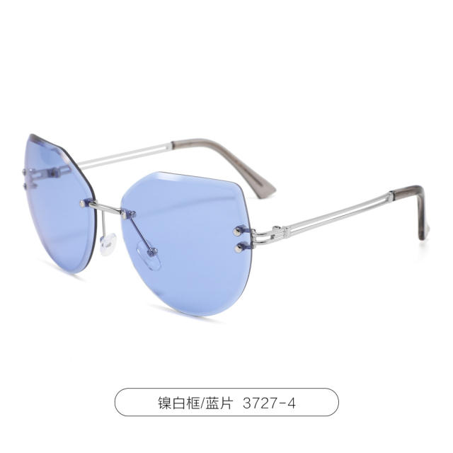 Cross border New Metal Large Frame Men's Sunglasses Personalized Frameless Cat Eye Sunglasses Women's Fashion Sunglasses Wholesale