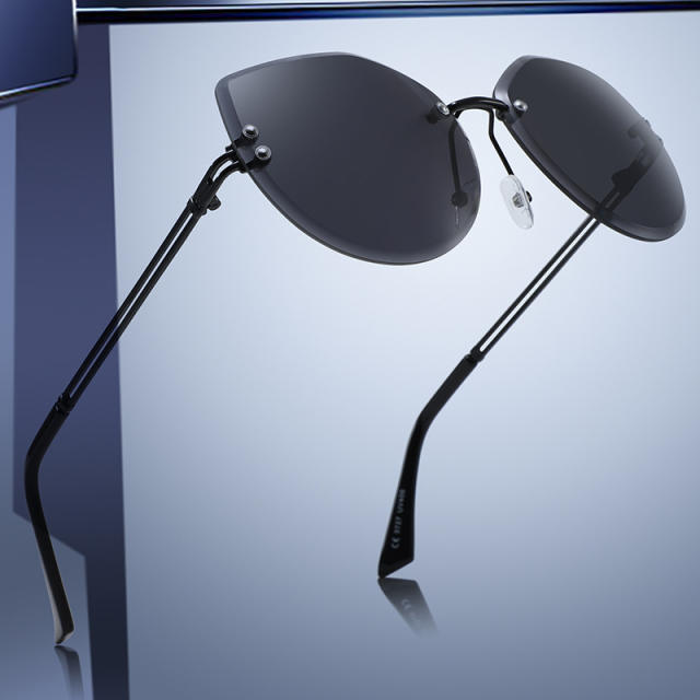 Cross border New Metal Large Frame Men's Sunglasses Personalized Frameless Cat Eye Sunglasses Women's Fashion Sunglasses Wholesale